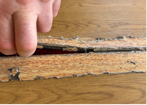 Pulling up a fallen seam on vinyl flooring